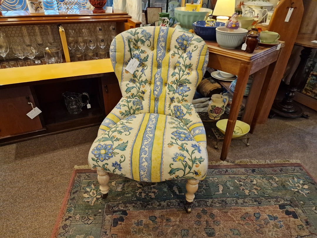 Upholstered Chair With Brass Castors