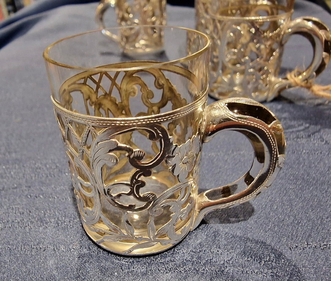 Four Silver And Glass Mini Cups